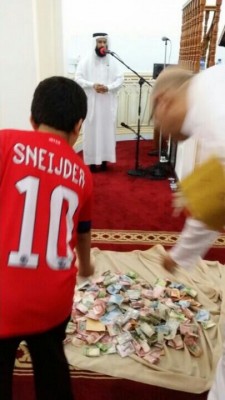 2.	Fundraiser in Salaheddine mosque in Al-Riffa, Sheikh Faisal Al-Gharir seen at the back