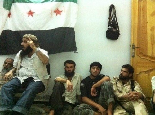 Adel Al-Mo'awada  heading a gathering of Jihadists in Syria
