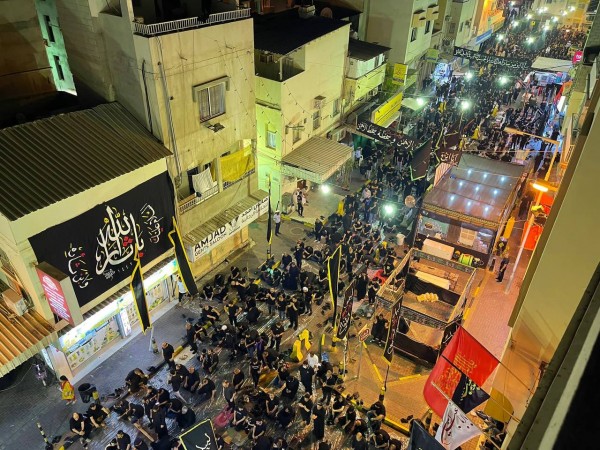 Thousands of Bahraini Shiites perform evening prayers on the 10th of Muharram eve in the capital, Manama - August 8, 2022